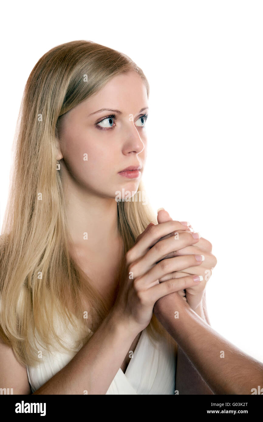 Das Mädchen hält zwei Hände die Hand eines Mannes auf weiß Stockfoto