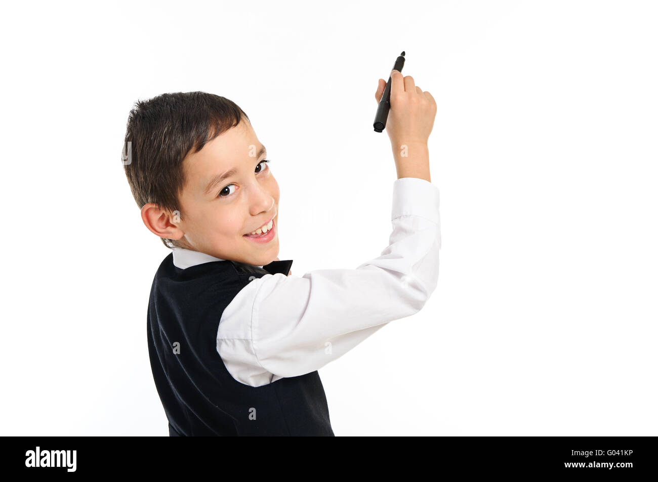 Schule junge Wrighting oder Zeichnung mit Stift isoliert auf weiss Stockfoto