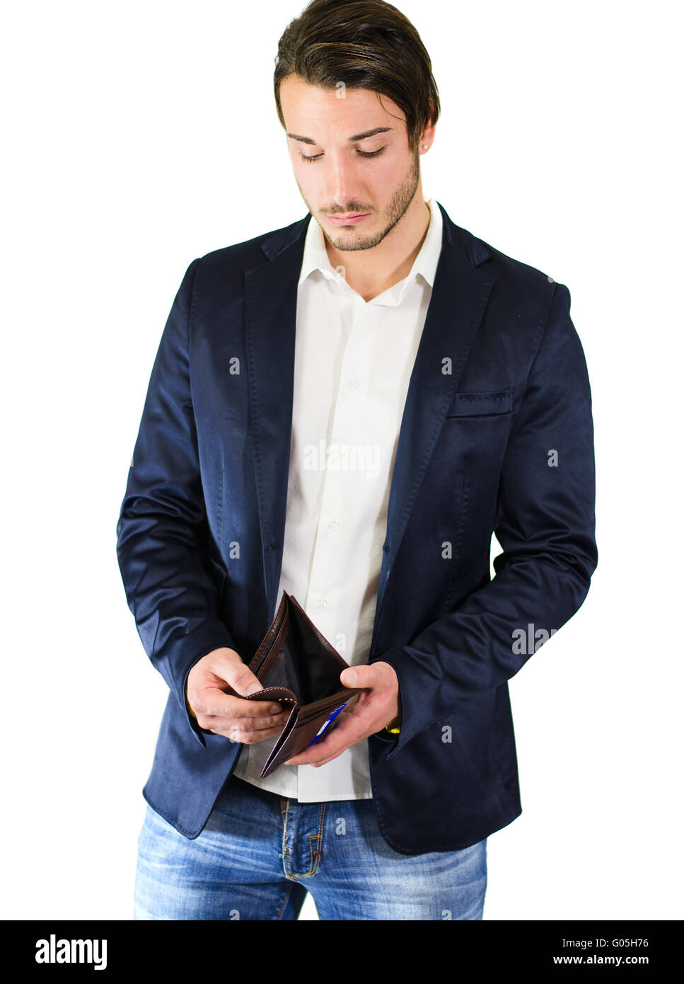 Unglücklich, besorgt Kerl Blick auf leere Brieftasche Stockfoto