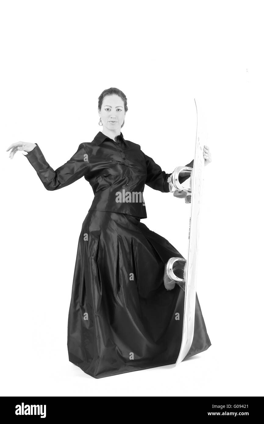 Frau mit langen lockigen Haaren, Gala Kleid und snowboard Stockfoto