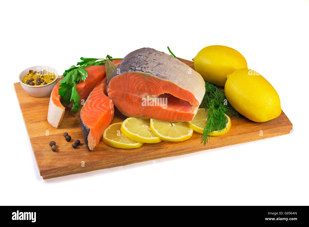 Fisch Lachs, Zitrone, grün auf weißem Grund. Stockfoto