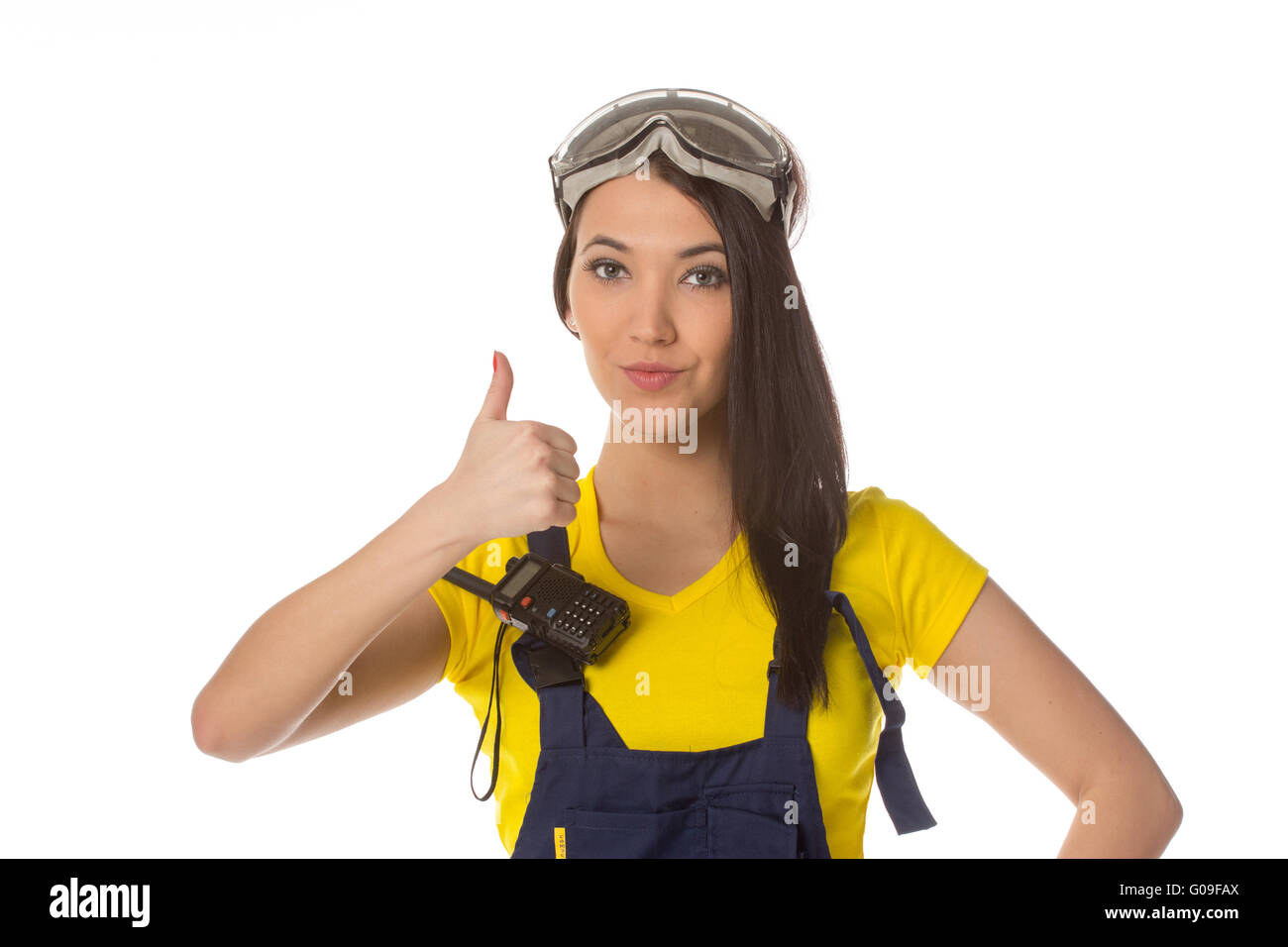 Eine weibliche Bauarbeiter ein ok Signal - isoliert halten. Stockfoto
