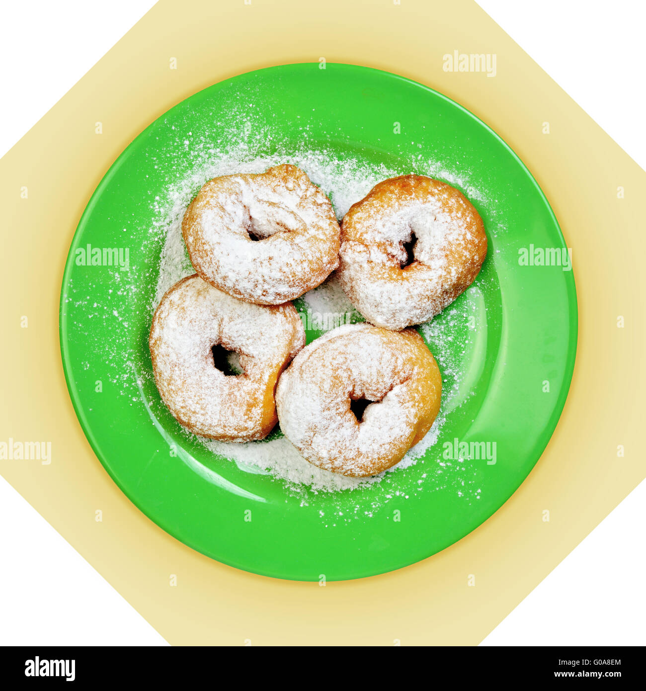 Grüne Schale mit Donuts mit Puderzucker überzogen Stockfoto