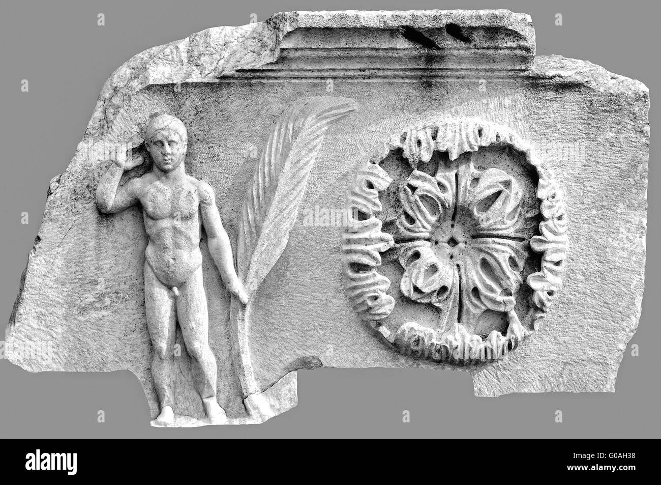 Figur Mann mit Palmwedeln und Rosette b & w Stockfoto