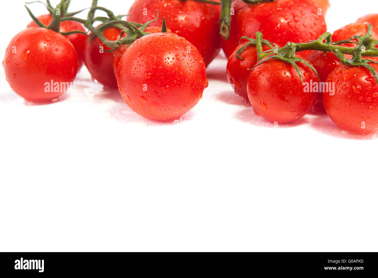 Frische Tomaten, isoliert auf weiss Stockfoto