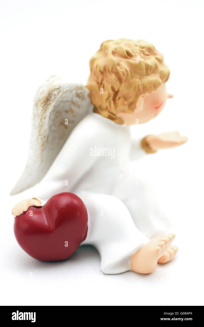 Bild von einem Engel mit einem roten Herz in der hand Stockfoto