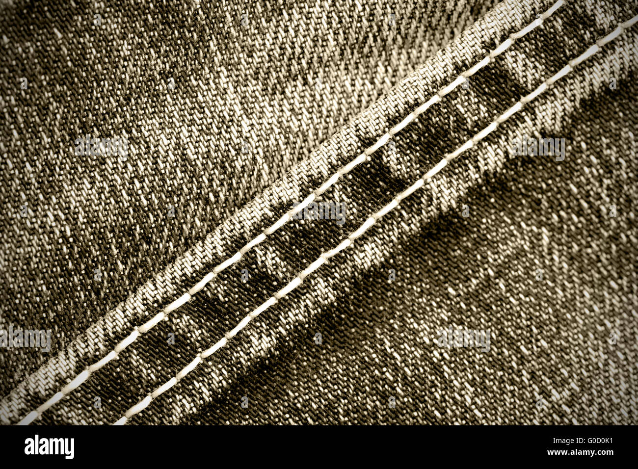 Teil der alten Jeans Hintergrund mit diagonalen Nähten Stockfoto