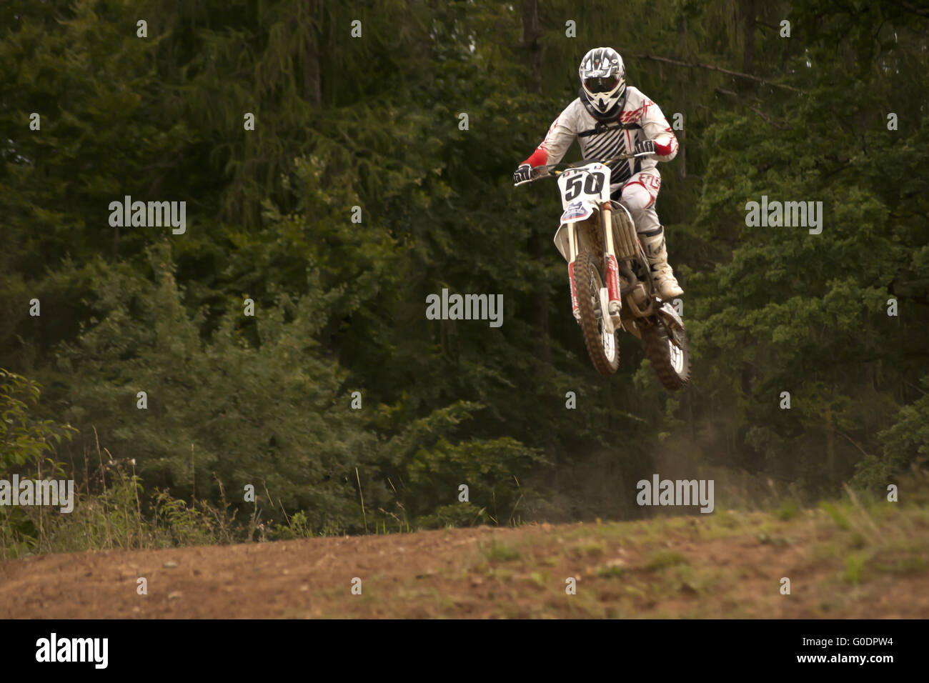 Motocross-Fahrer im Rennen Stockfoto