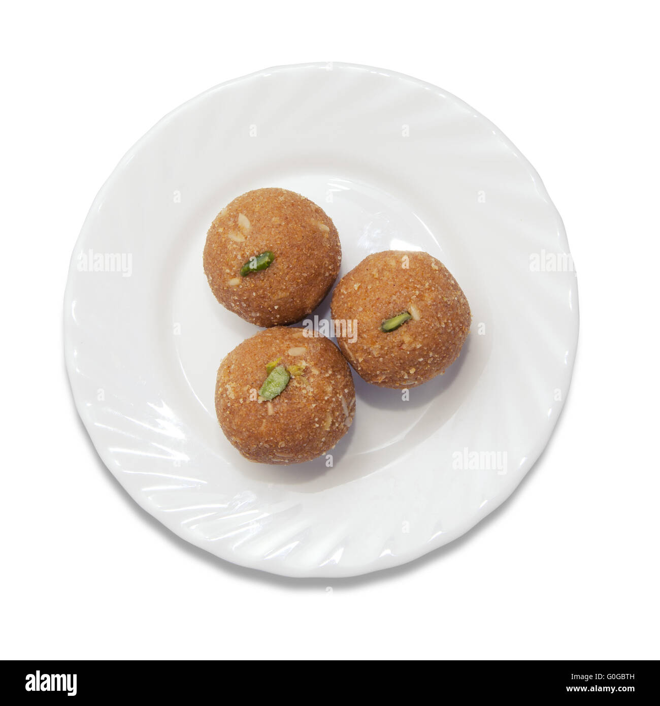 Indische Süßigkeiten auf einem Teller Stockfoto
