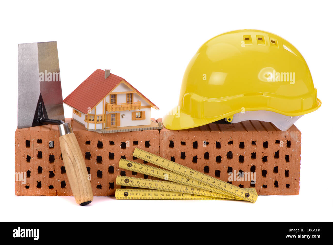 Ziegel und Werkzeug für den Hausbau Stockfoto