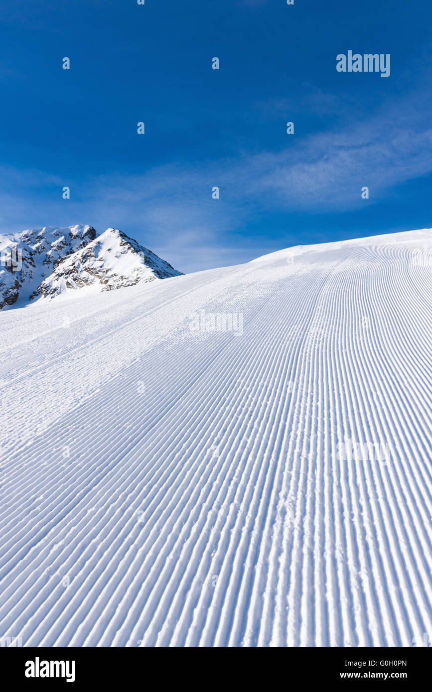 Ski-Abfahrt Trail Pistenraupe Stockfoto