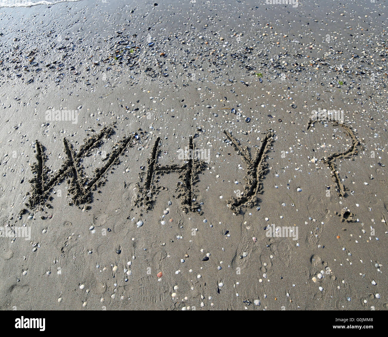 Große, warum auf dem Sand des Meeres geschrieben Stockfoto