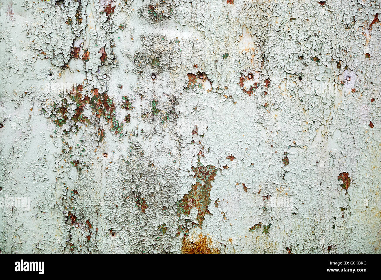 Hintergrund der alten abblätternde Farbe mit Rissen und Rost. Alten verwitterten Peeling Paint Textur. Stockfoto