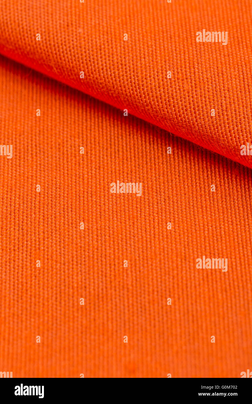 Textur aus weich orange Streifen Baumwollstoff Stockfoto