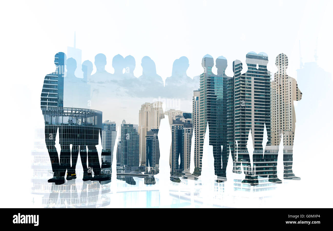 Business-Menschen-Silhouetten über Stadt Hintergrund Stockfoto