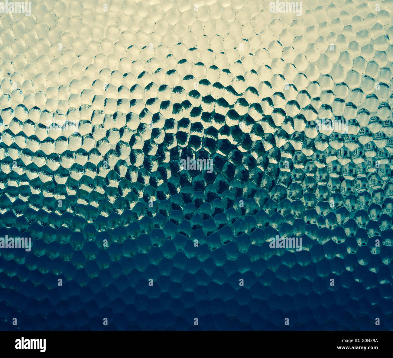 Dieses abstrakte Kunst Bild von Bubble Glas gibt die überlegen was dieses dunkle Gebiet dahinter ist. Stockfoto