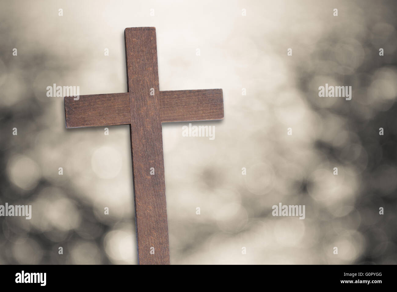 Das Kreuz von Jesus Christus auf Bokeh Hintergrund Stockfoto