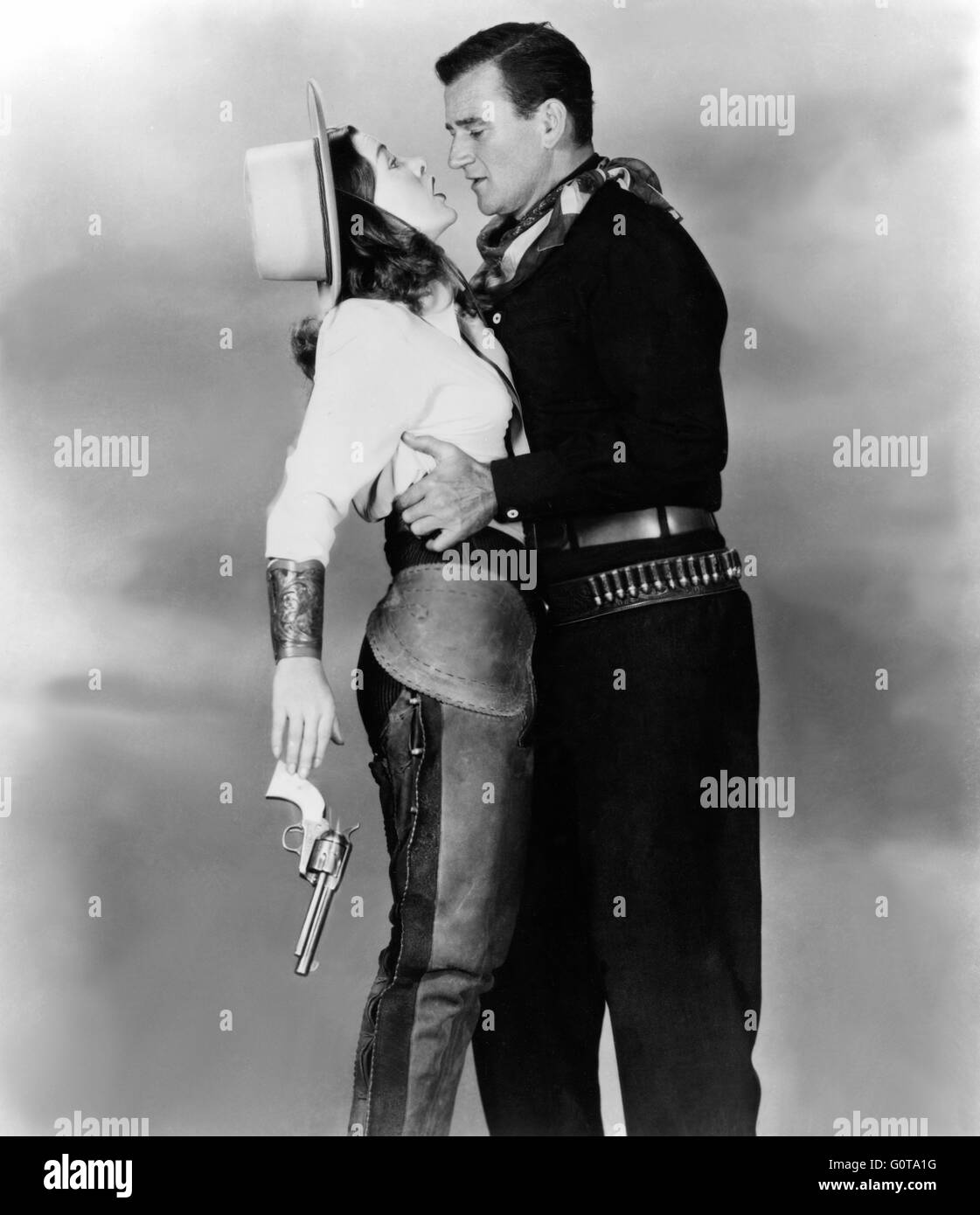 Ella Raines und John Wayne / hoch im Sattel / 1944 unter der Regie von Edwin L. Marin [R.K.O Radio] Stockfoto