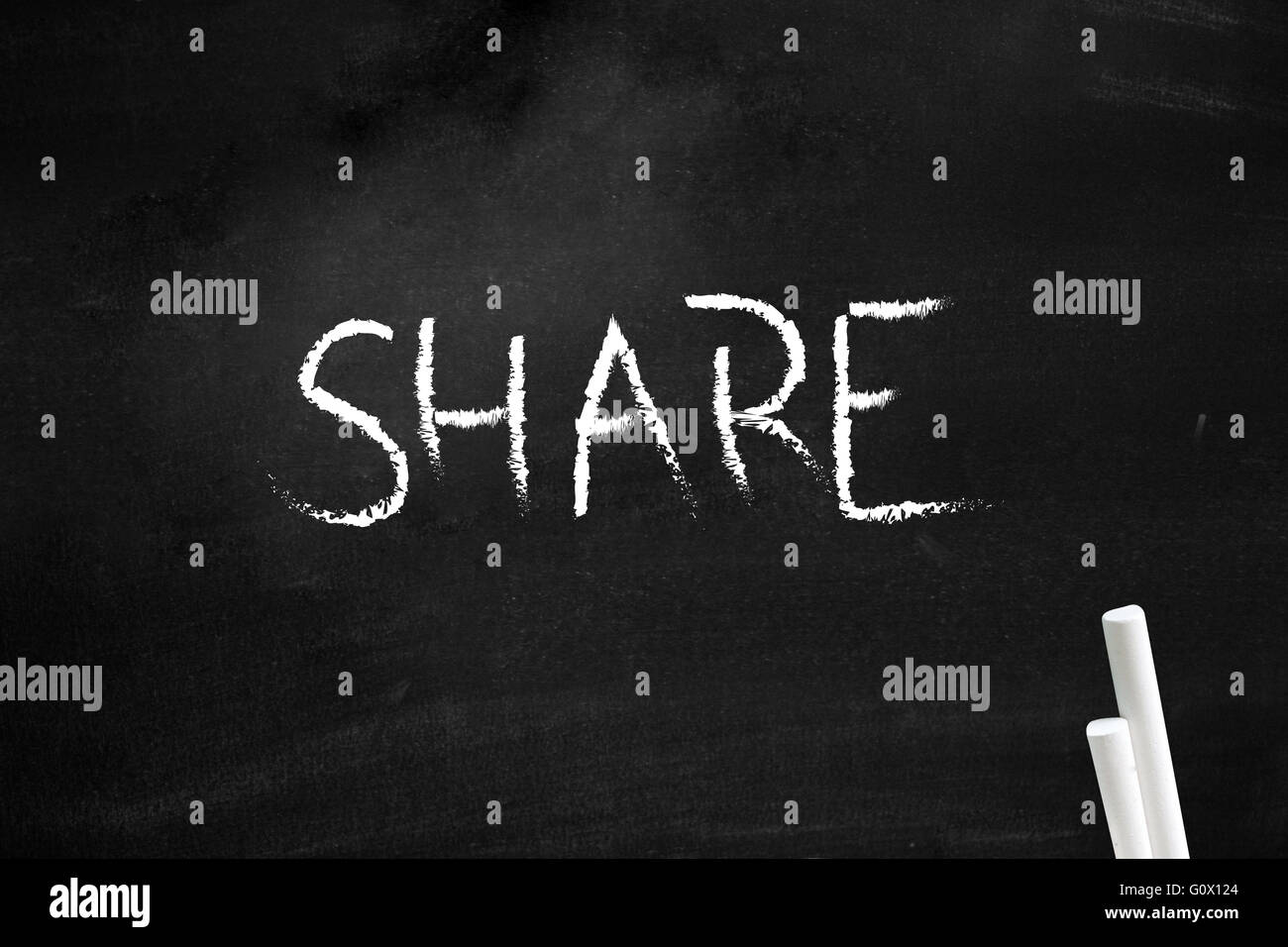 Teilen auf Tafel geschrieben Stockfoto