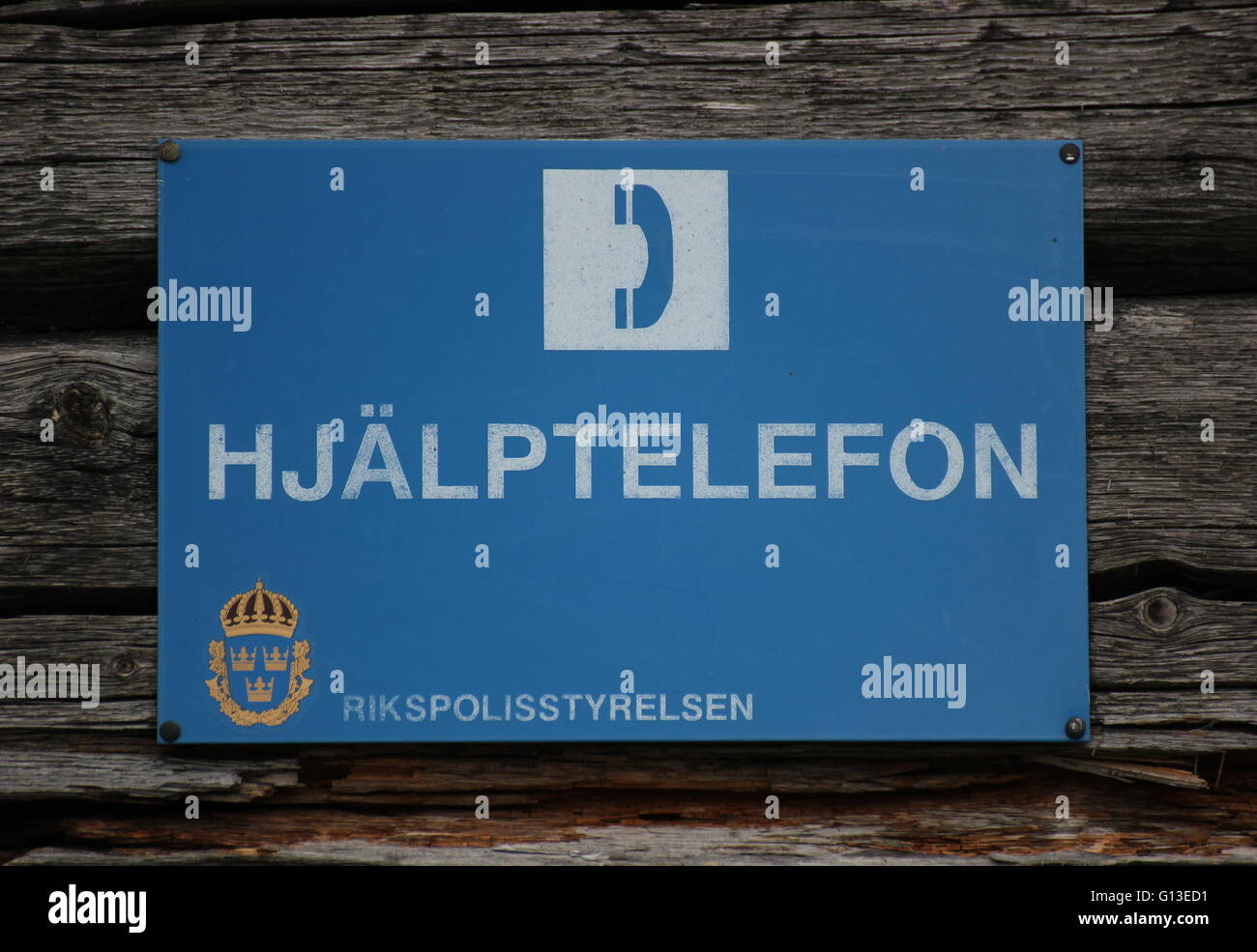 Hjälptelefon ("Notruftelefon") Zeichen in Schweden. Auf den Botton die Wappen von Rikspolistyrelsen (schwedische Nation Stockfoto