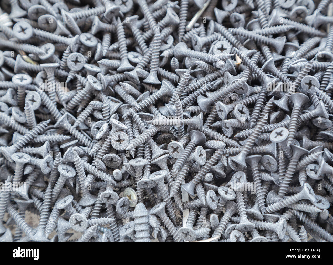 Hintergrund der vielen silbernen Schrauben Stockfoto