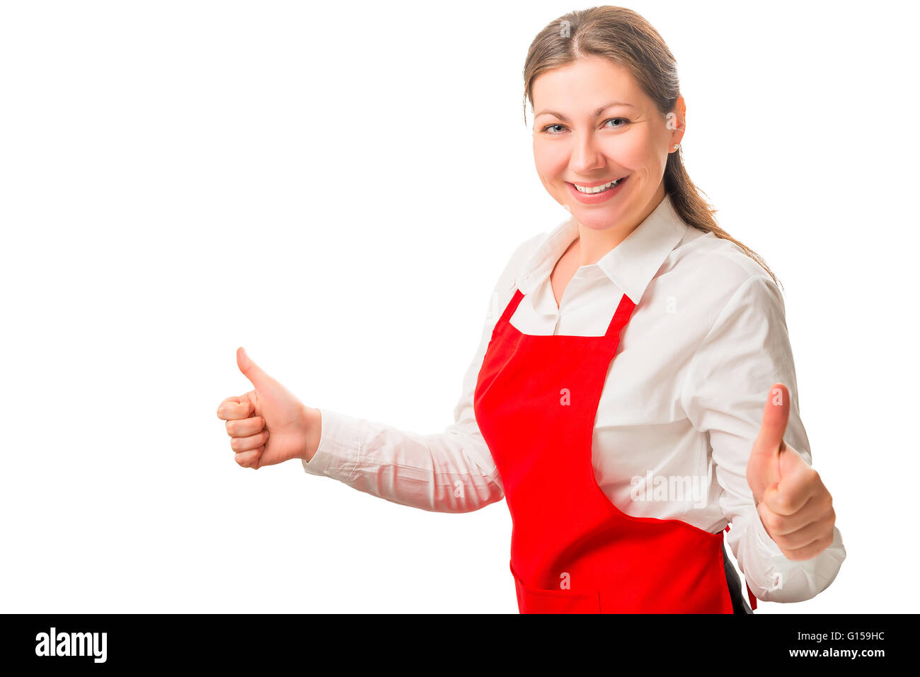 glückliche Frau in einem roten Schürze ist zufrieden Stockfoto