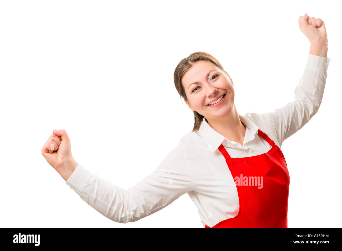 erfolgreiche freut sich eine Hausfrau in rote Schürze isoliert Stockfoto