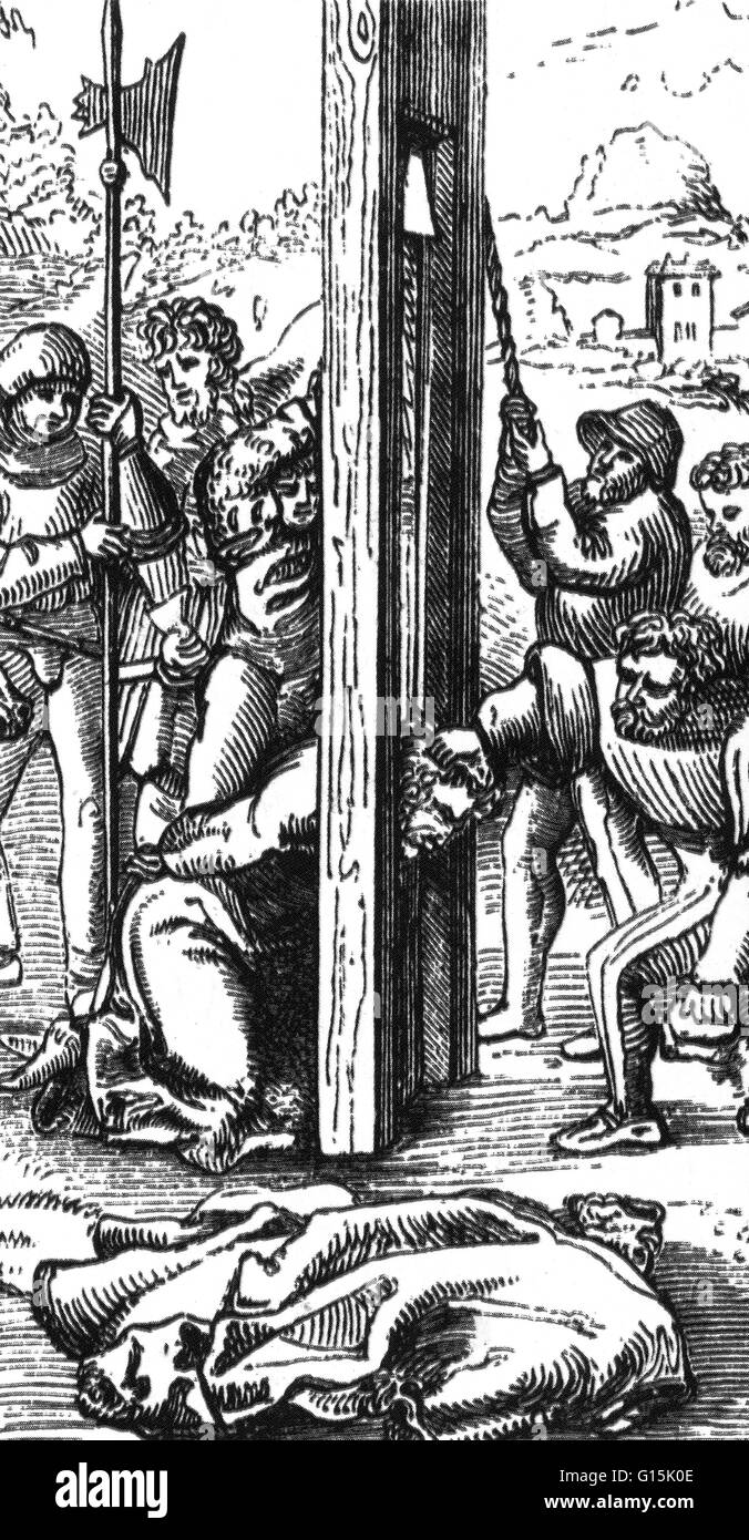 Die Guillotine ist ein Gerät zur Durchführung von Hinrichtungen durch Enthauptung. Es besteht aus einem hohen aufrechten Rahmen eine abgewinkelte Klinge aufgehängt. Diese Klinge ist mit einem Seil angehoben und durfte dann ablegen, der Kopf vom Körper trennen. Die Bedienfläche Stockfoto