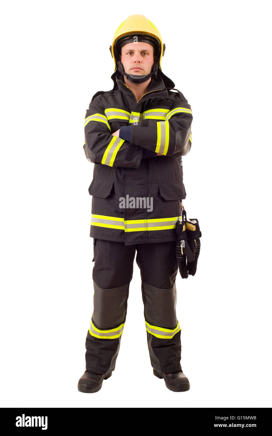 Schwere Feuerwehrmann posiert mit Arme gekreuzt. Voller Länge Studio gedreht isoliert auf weiss. Stockfoto