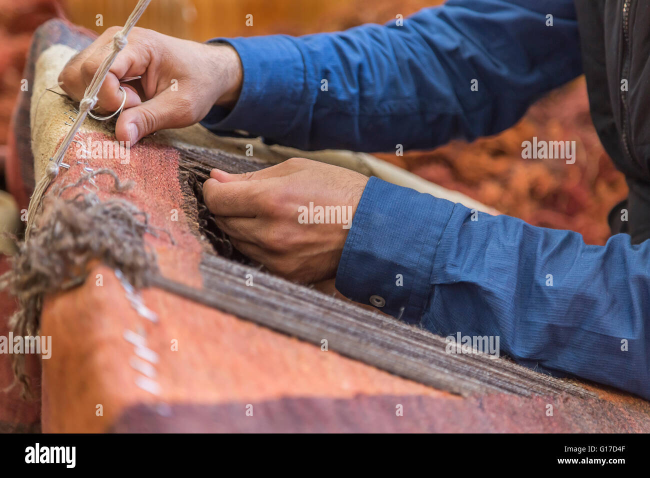 Teppich-Restaurierung Stockfoto