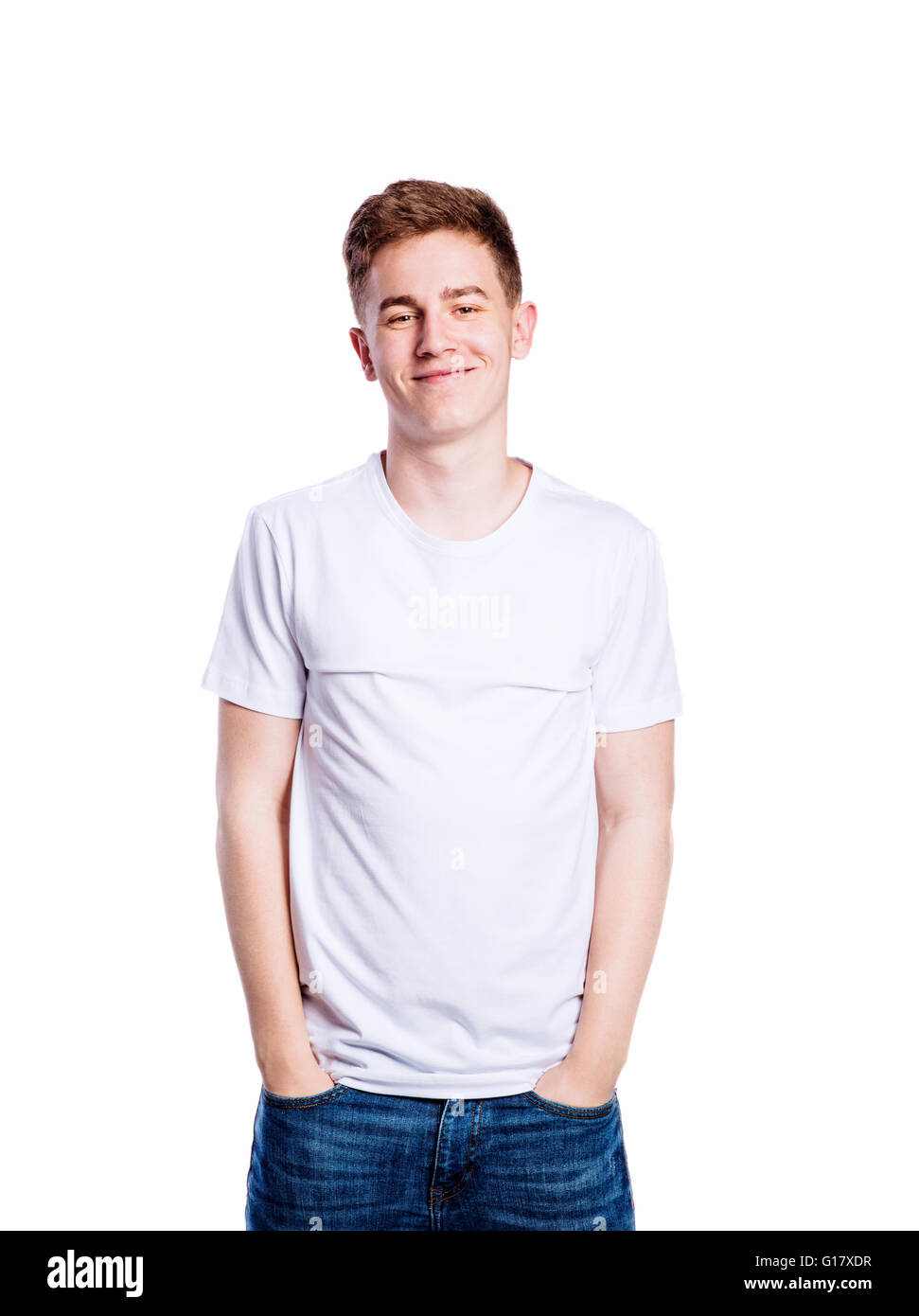 Junge in Jeans und T-shirt, junger Mann, Studio gedreht Stockfoto