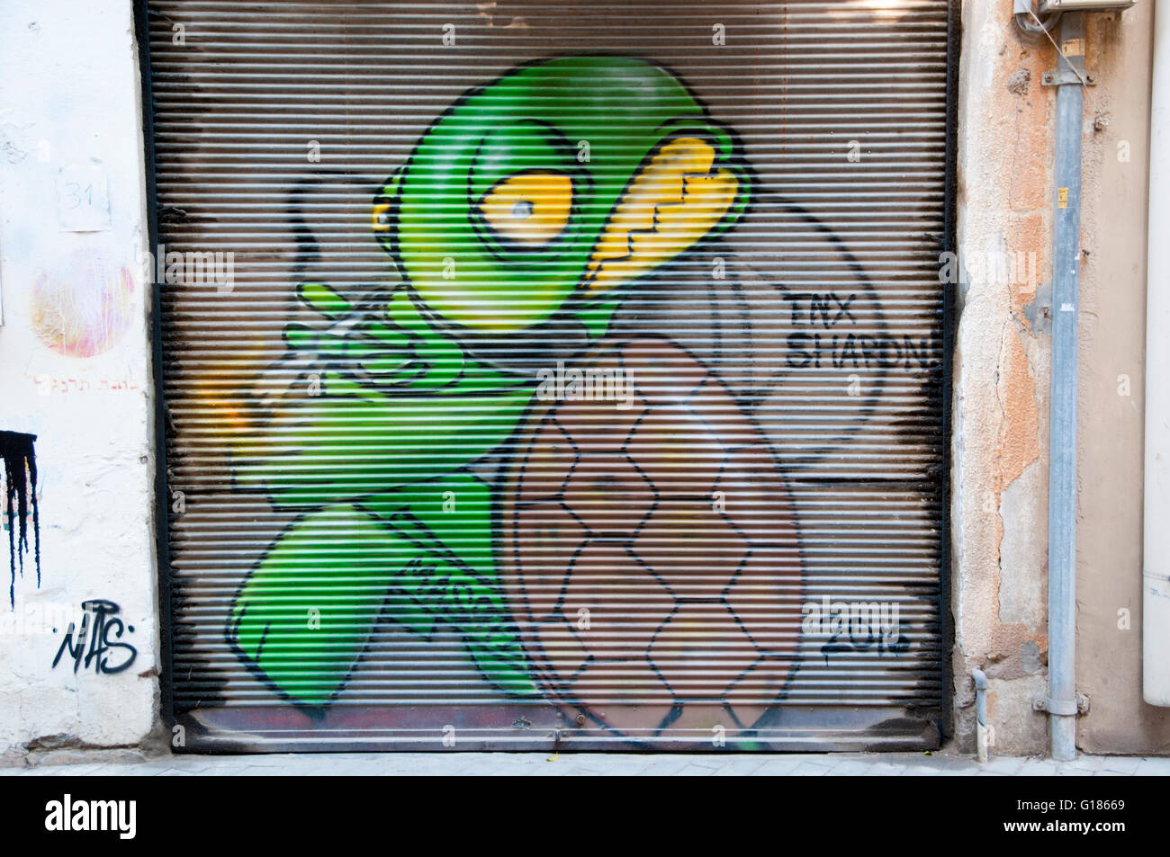 Schildkröte mit einem gemeinsamen Graffiti Wandkunst im Florentin Viertel, Tel Aviv Stockfoto