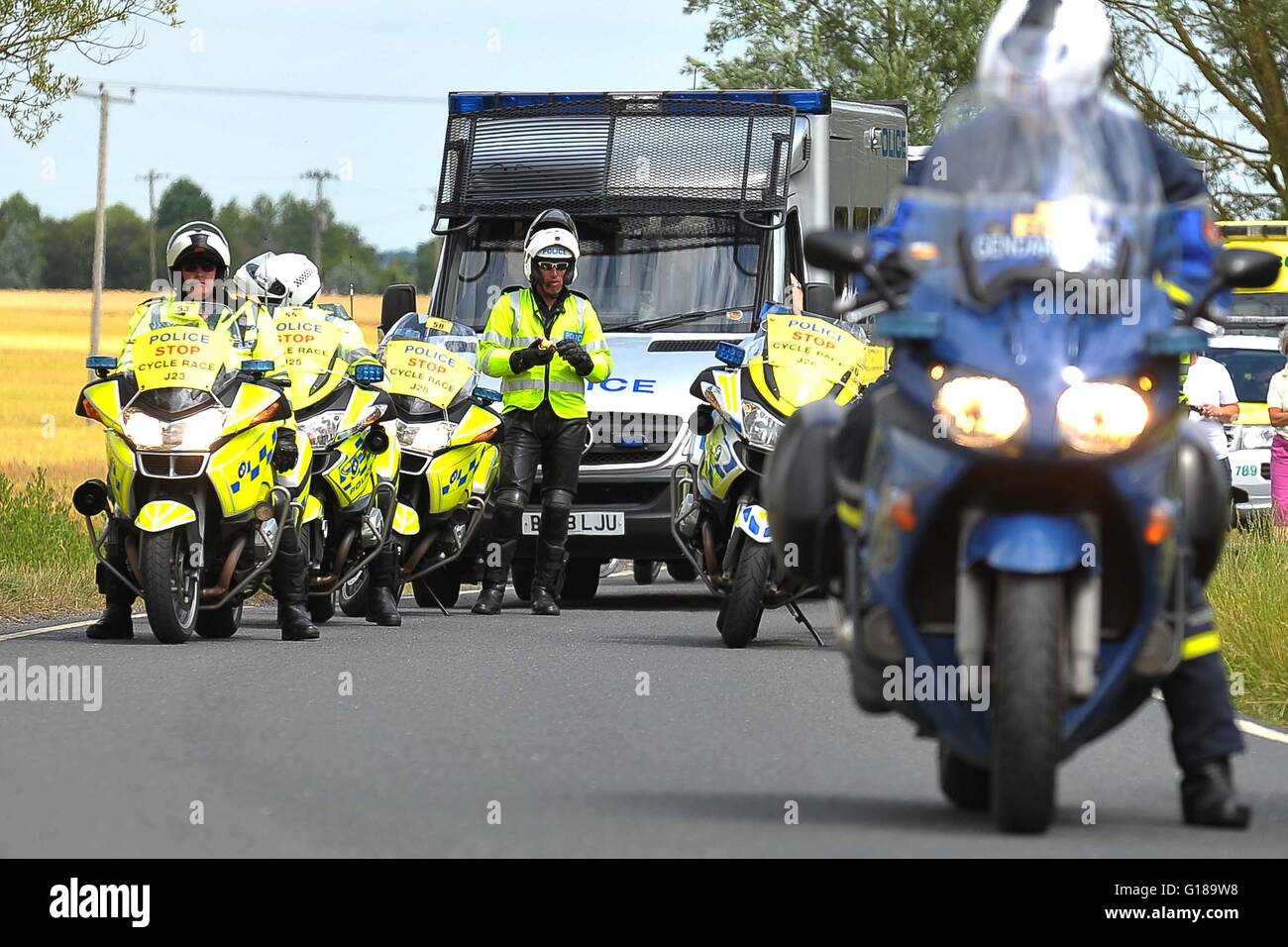 Le Tour de France UK Roxwell 2014 Polizei Motorrad Outriders Stockfoto