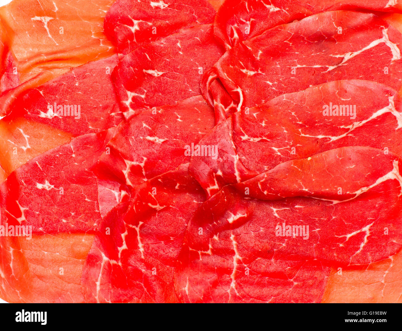 Bresaola Scheiben rotes Fleisch traditionelle Textur Hintergrundmuster Stockfoto