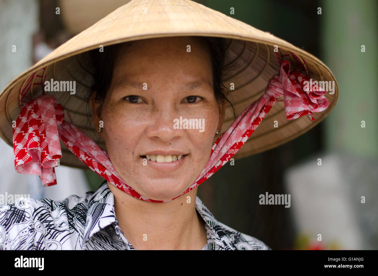 Eine Frau auf My Tho, Vietnam Stockfoto