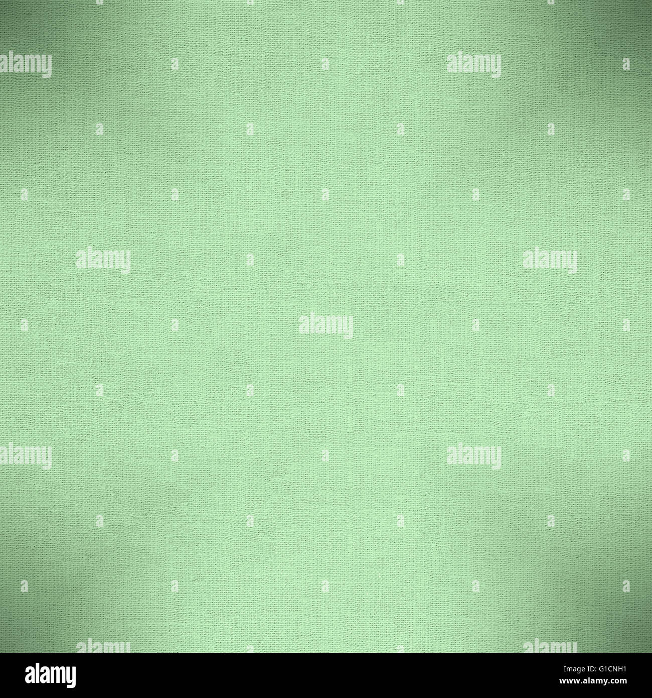 grüne Baumwolle Textur oder gewebte Leinwand Hintergrund Stockfoto