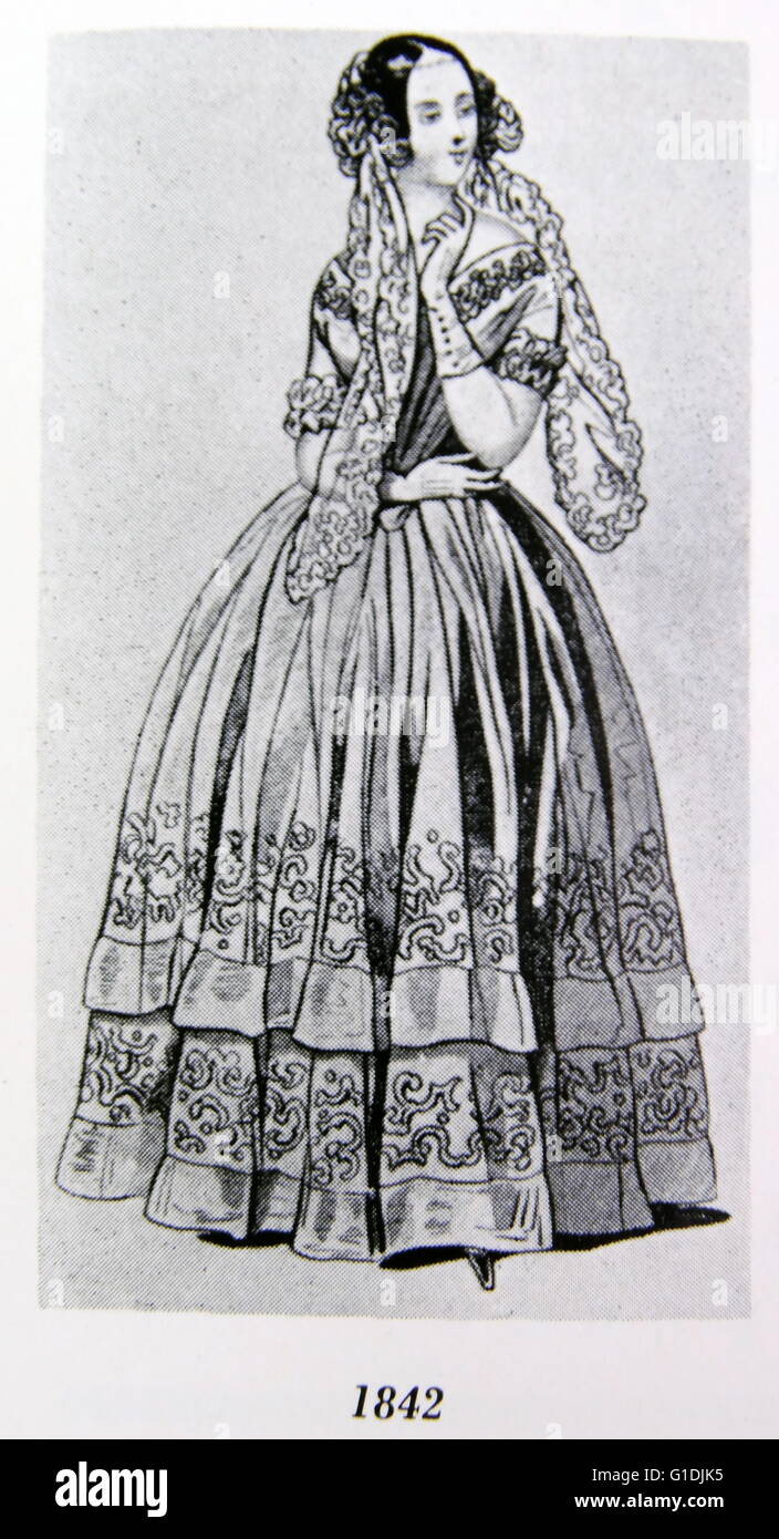 Frau im typischen Outfit aus den 1840er Jahren. Stockfoto