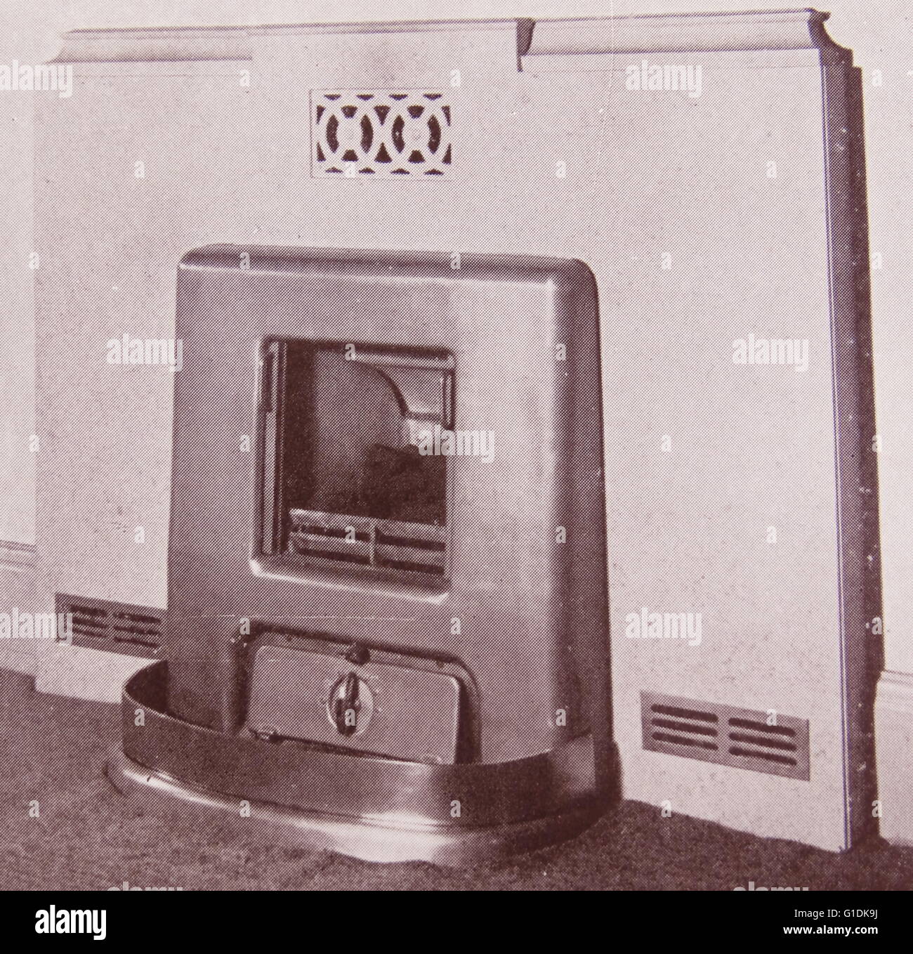 Werbung für ein Gasfeuer Kohle-Effekt für ein neues Zuhause, Brite/Britin um 1950 Stockfoto