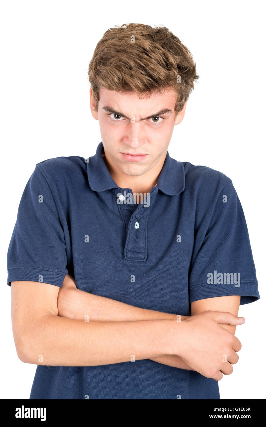 Wütende Teenager Grimassen isoliert in weiß Stockfoto