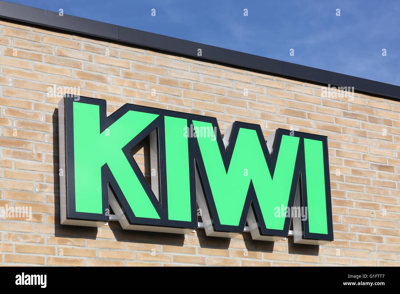 Kiwi-Logo an der Wand Stockfoto