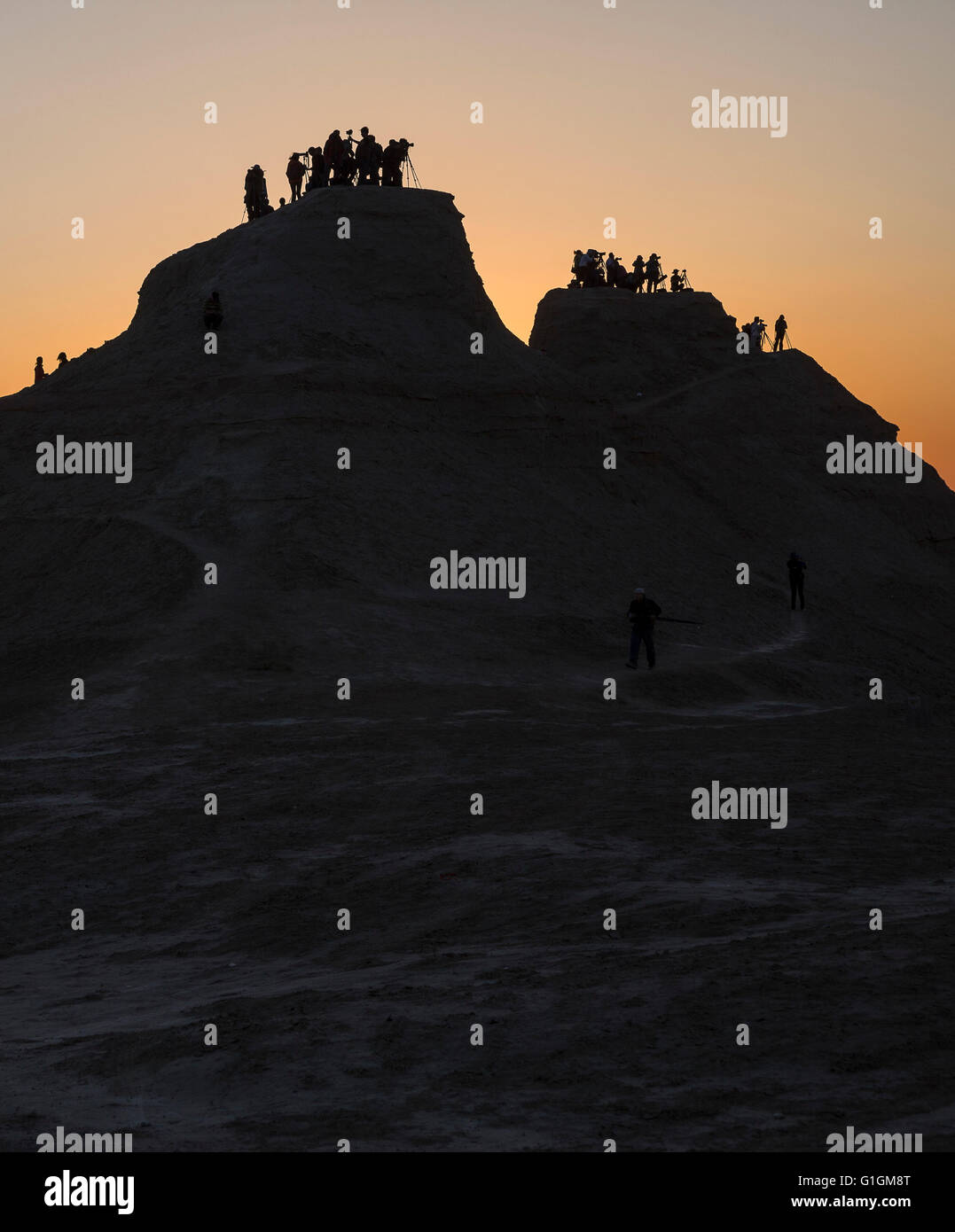 Sonnenuntergang in Geisterstadt, Gubantünggüt Wüste, Xinjiang Autonome Region, China. Stockfoto