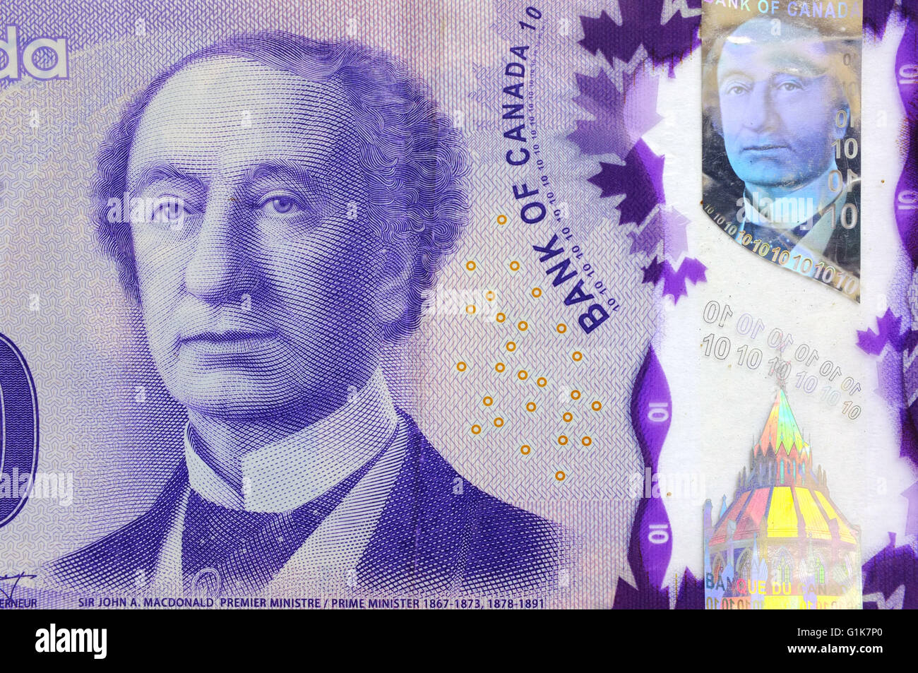 Eine Nahaufnahme von der Vorderseite einer kanadischen zehn-Dollar-Note vor weißem Hintergrund fotografiert. Stockfoto