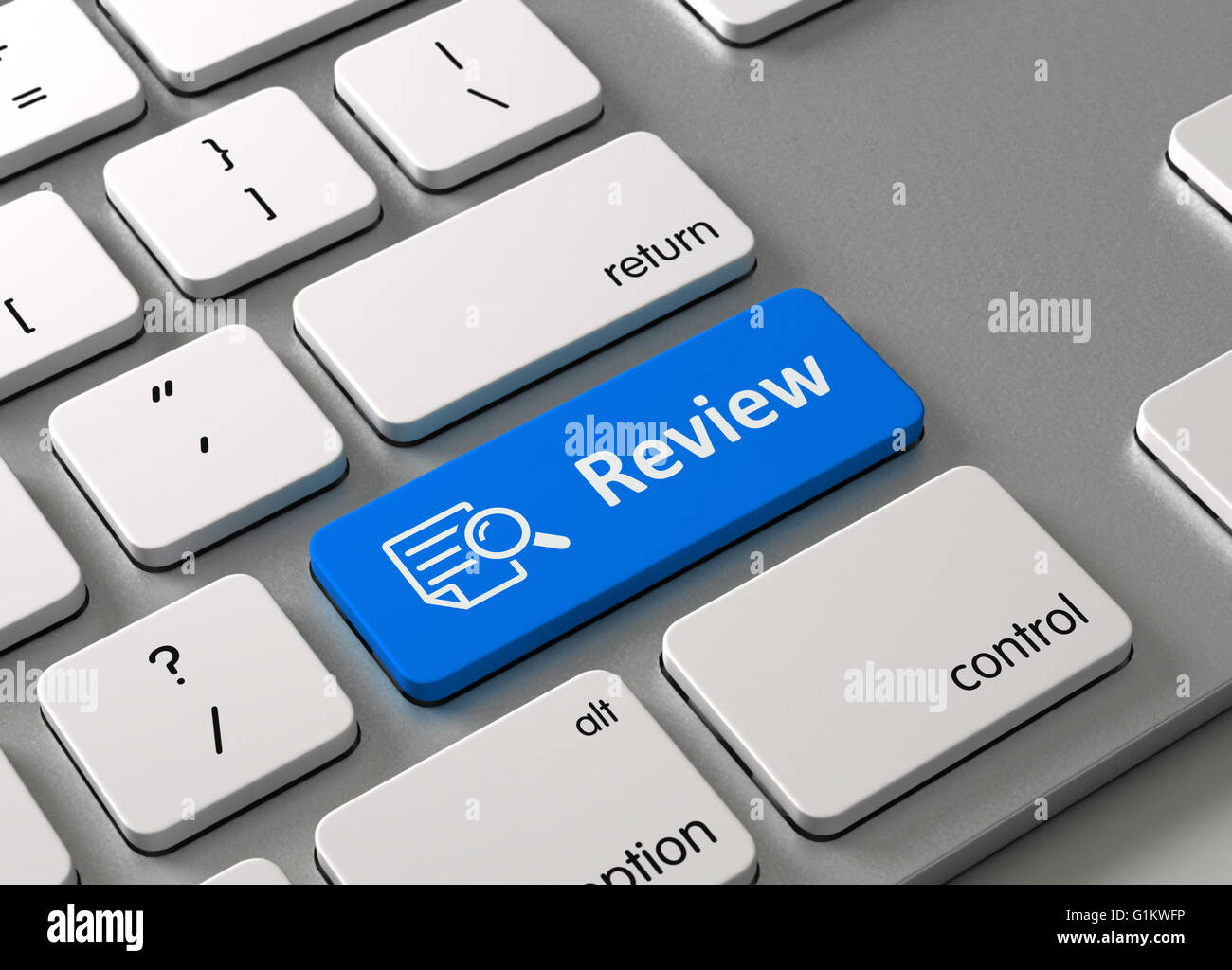 Eine Tastatur mit einem blauen Knopf Review Stockfoto