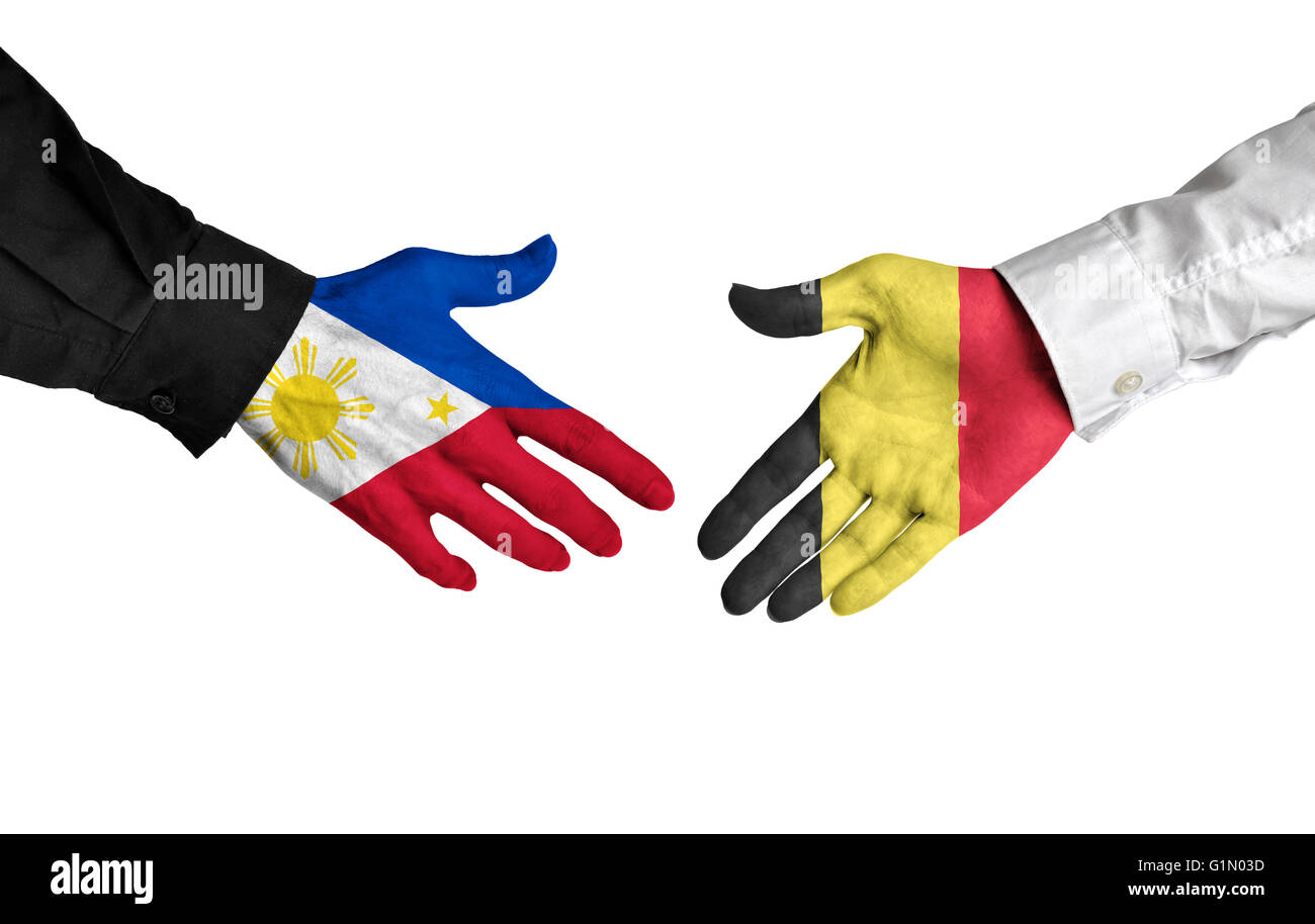 Philippinen und Belgien Führer Händeschütteln auf ein Geschäft Abkommen Stockfoto