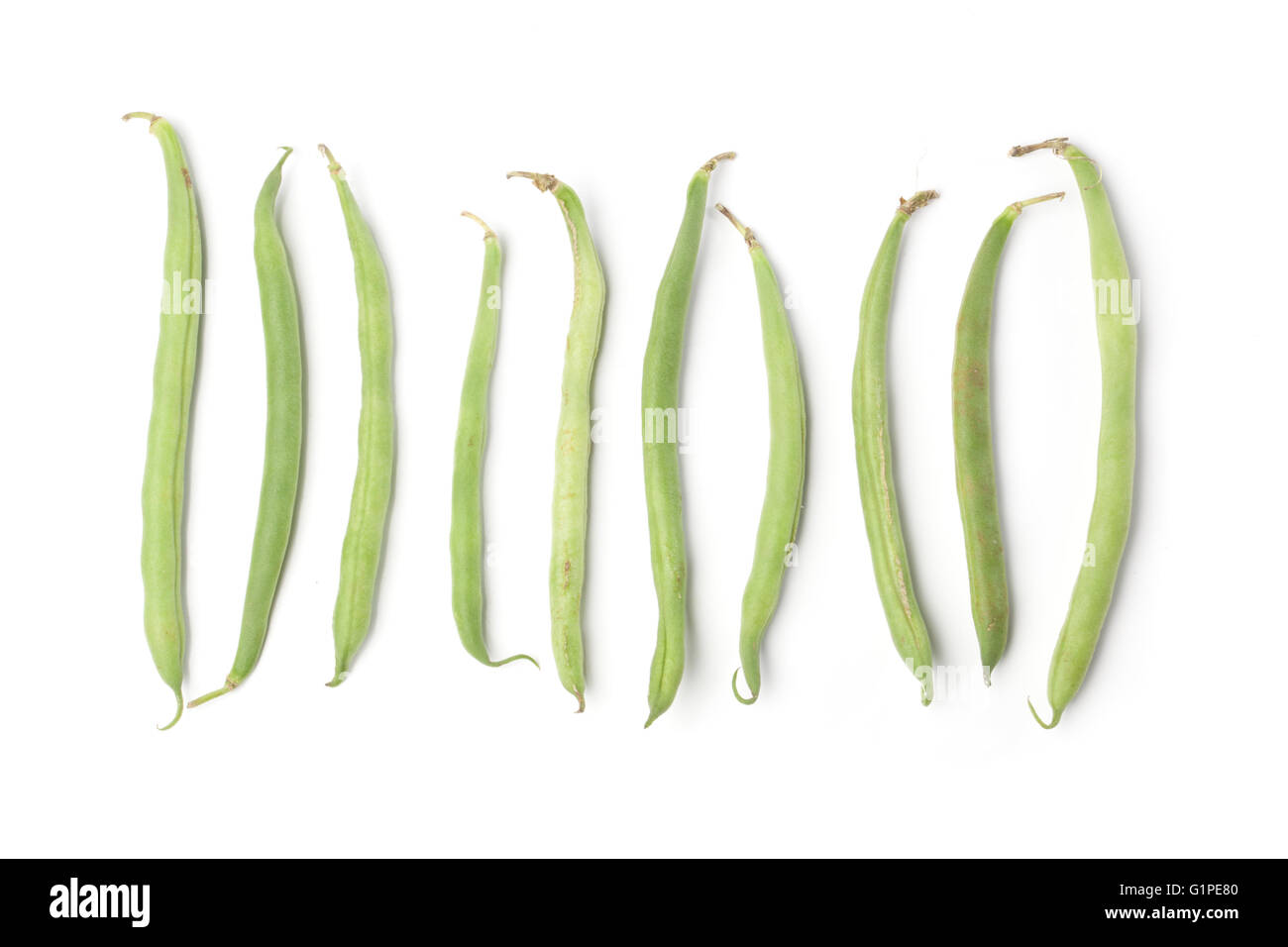 Frische grüne Bohnen, isoliert auf weißem Hintergrund. Stockfoto