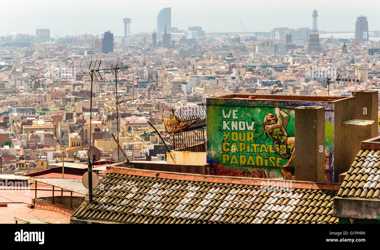 Wir wissen Ihr kapitalistisches Paradies Graffiti mit Blick auf Barcelona City Centre vom Park Güell Bereich. Stockfoto