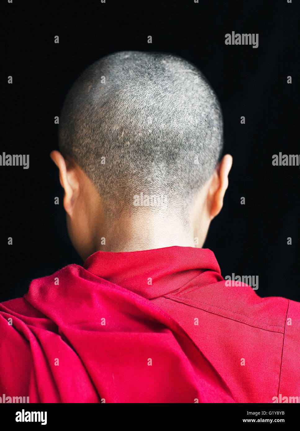 Porträt eines tibetischen Nonne/Mönch. McLeod Ganj, Dharamsala, Indien Stockfoto