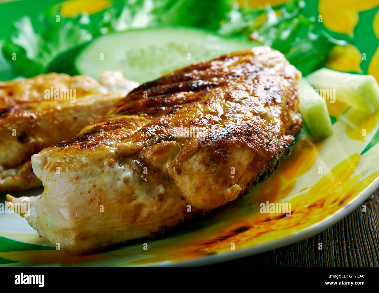 Huhn mit Sauce Piri piri Stockfoto