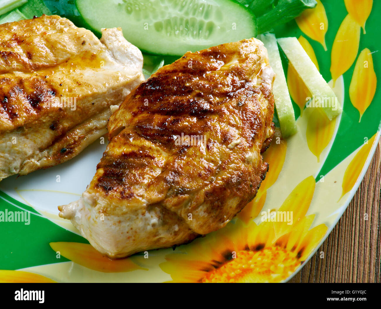 Huhn mit Sauce Piri piri Stockfoto