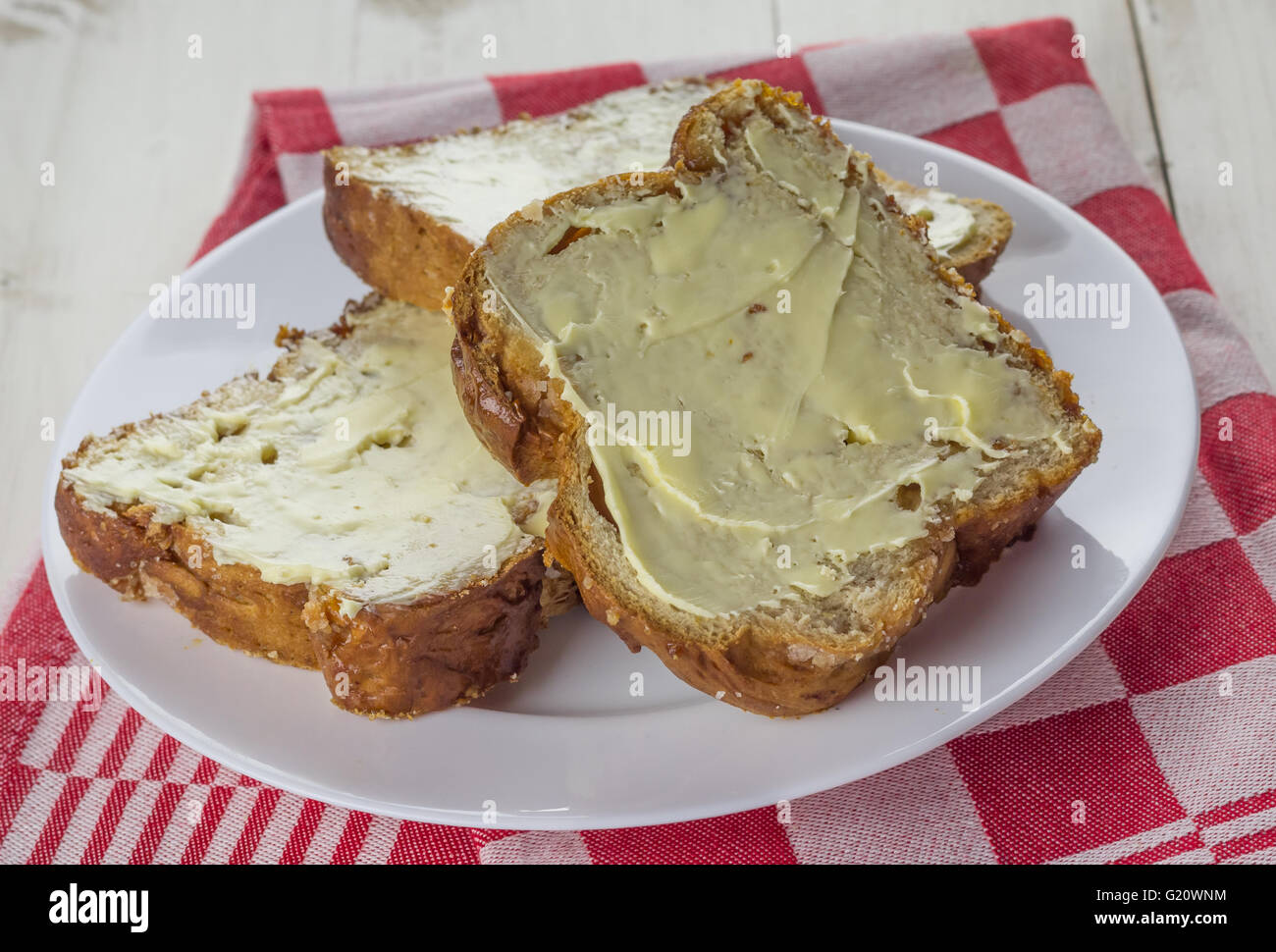Traditionelle holländische Zucker Brot mit Butter auf einem weißen Teller Stockfoto